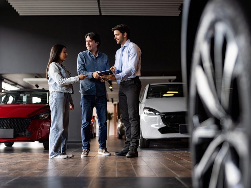 Fillback CDJR salesperson helping customers